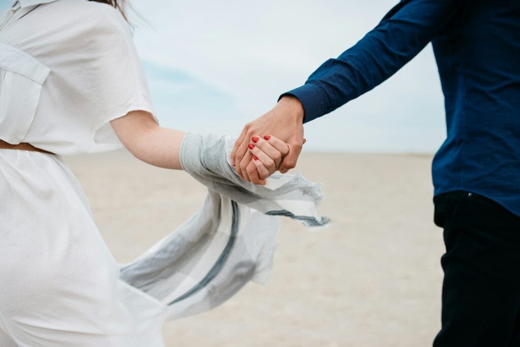 Transformational Tools Shop for Change | Mind Soul Wellness | Navigating Life Change 17 man and woman holding hands together in field during daytime